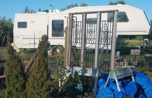 Florence Haus | Montana Mountain Memories- RV in Orchard by Trout Pond