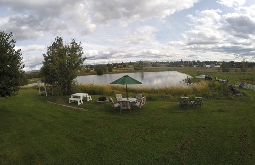 Florence Haus | Montana Mountain Memories- RV in Orchard by Trout Pond