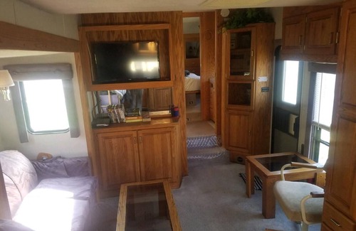 Florence Haus | Montana Mountain Memories- RV in Orchard by Trout Pond