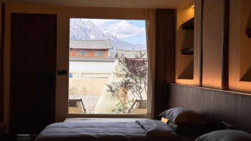 Lijiang Haus | More Sunshine Villa 猫在雪山下田野里民宿