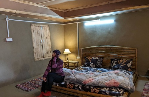 Gunehr Haus | Mudhouse in tranquility and Dhauladhar's wondrous delight