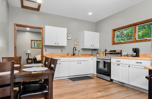 Big Rapids Haus | Nestled in the woods, this private detached Guest House is a perfect getaway!