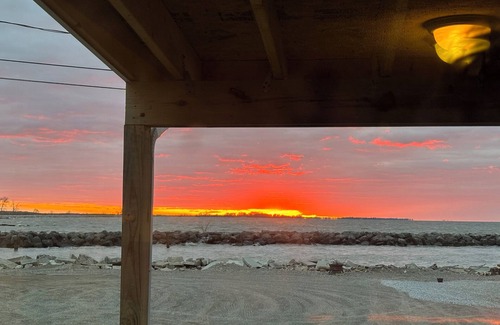 Oak Harbor Haus | New! 30 seconds from couch to shore, covered front porch w/sunset water views.