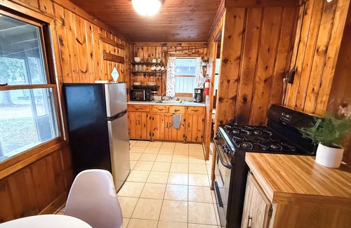 Branch Kabine | New listing! Rustic 6-cabin resort on Long Lake with a beach and waterslide