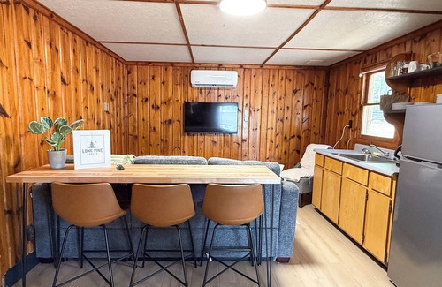 Branch Kabine | New listing! Rustic 6-cabin resort on Long Lake with a beach and waterslide