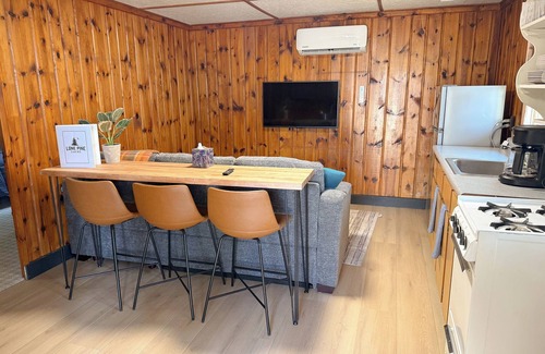 Branch Kabine | New listing! Rustic 6-cabin resort on Long Lake with a beach and waterslide