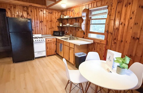 Branch Kabine | New listing! Rustic 6-cabin resort on Long Lake with a beach and waterslide