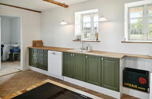 Majbolle Haus | Nostalgic Charm In A Yellow Timber House