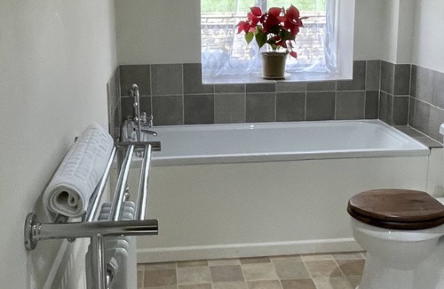 Duntisbourne Abbots Wohnung | Nutbeam Cottage: Rustic Charm Meets Modern Luxury in the Cotswolds