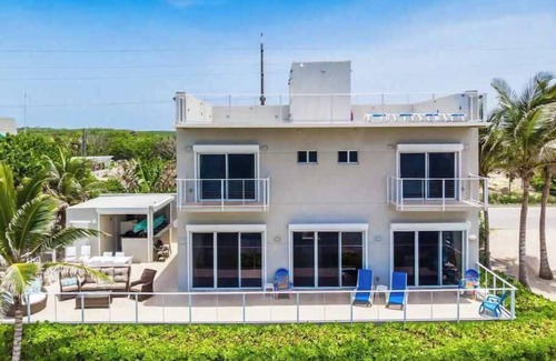 North Side Haus | Ocean's Edge: Beachfront Home with Rooftop Views