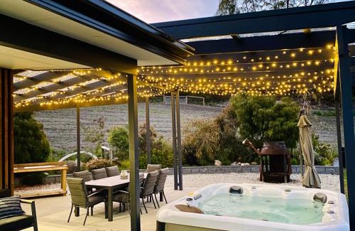 Lower Snug Haus | Ocean views, spacious & private, hot hub