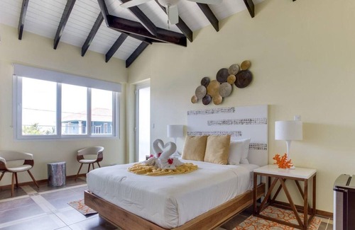 Placencia Resort | Oceanfront Condo w/ Large Veranda & WiFi - Steps to Beach, Shops, & Dining