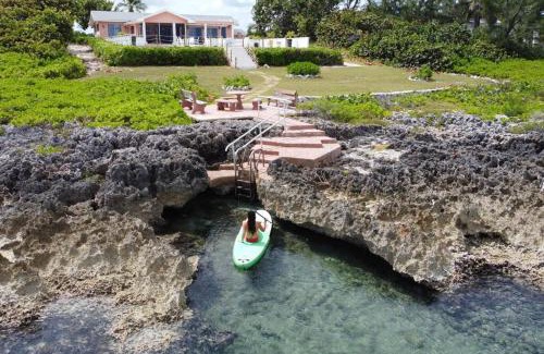 West Bay Haus | Oceanfront Oasis Home with cottage & pool
