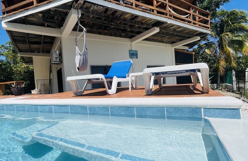 Caye Caulker Wohnung | KÜSTE CARIBBEAN SUITE