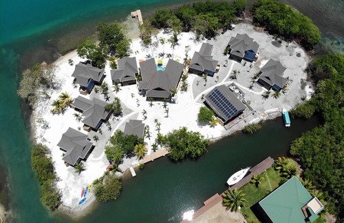 Placencia Haus | Oceanview Suite with King Bed, Lounge Space & Outdoor Rain Shower