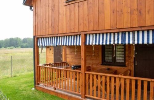 Włodawa Resort | OLIWIER domki letniskowe Okuninka