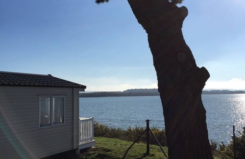 Hamworthy Haus | Orchid - dog friendly with sea view on Rockley Park, Poole