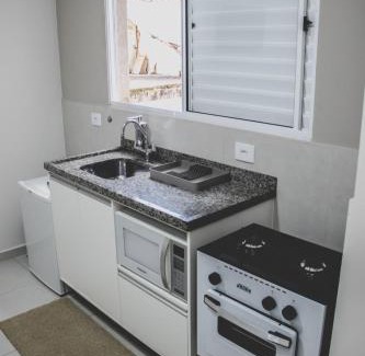 Itajuba Wohnung | Otima kitnet prox a UNIFEI c Wi-Fi e Smart TV