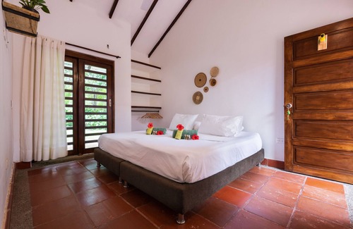 Palomino Kabine | Our Forest lodge consists of 7 rooms, a mandala-style garden