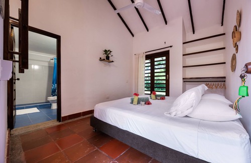 Palomino Kabine | Our Forest lodge consists of 7 rooms, a mandala-style garden