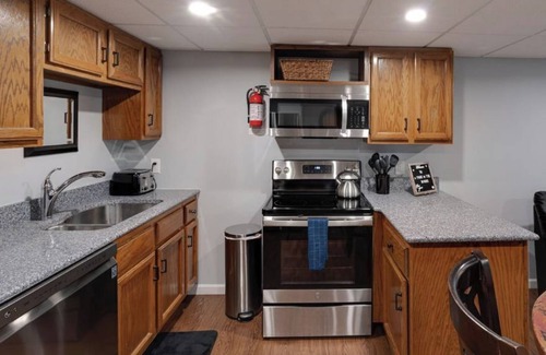 Lapeer Haus | Park in the Woods Cozy and clean. Shared Hot Tub