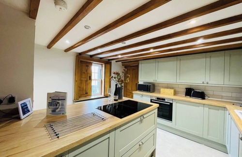 Hulme End Haus | Pass the Keys | The Old Shop Cosy Cottage for 6 & Furry Friends