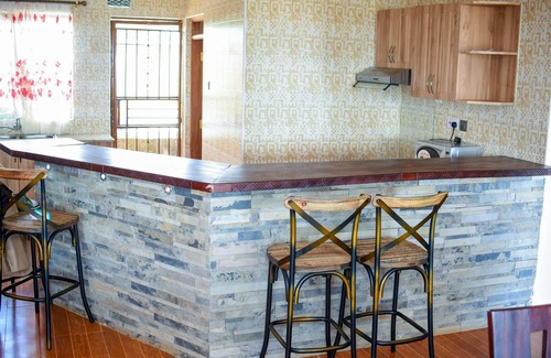 Kiserian Haus | Patch of heaven - In Kiserian