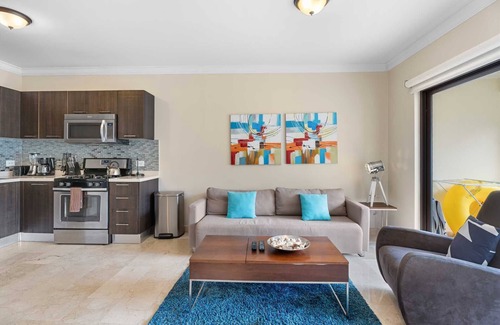 Washington Eigentumswohnung | Tropische Schönheit, gemütliche und charmante Wohnung mit herrlichem Poolblick