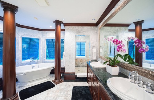 Bodden Town Villa | Pease Bay House: Beachfront Villa w/Private Tennis Court, Infinity Pool + Backyard Snorkeling