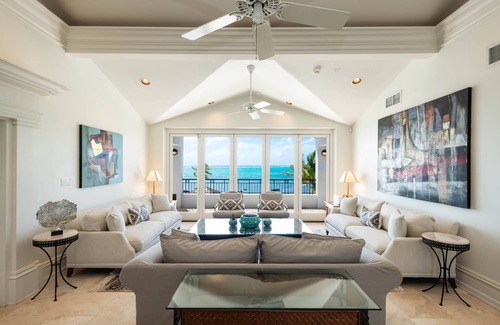 Bodden Town Villa | Pease Bay House: Beachfront Villa w/Private Tennis Court, Infinity Pool + Backyard Snorkeling