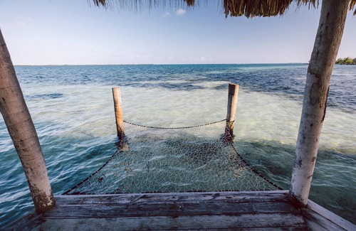 Thatch Caye Resort | Penthouse Oceanfront Cabana w/ Private Ocean-Facing Balcony & Amazing Views
