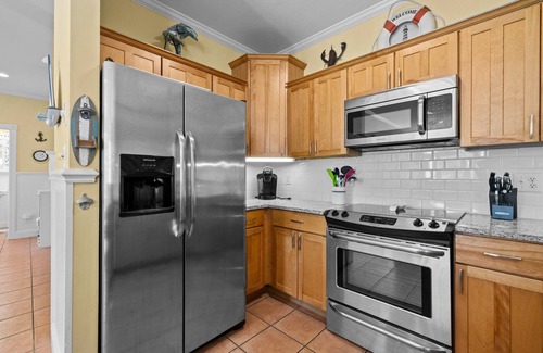 Emerald Isle Haus | Pet Friendly, Oceanside Interior Home Private Pool, Golf Cart, and Easy Access.