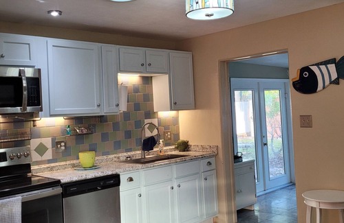 Edgewater Haus | Pet Friendly with no pet fees and pool access " The Riverwalk cottage"