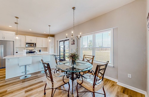 Callaway Haus | Pleasant neighborhood home with open layout, full kitchen, balcony, & central AC