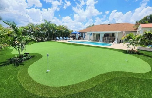 Port Saint Lucie Resort | Port St Lucie 4 Bedroom Home With Private Oasis - Pool, Bar & Golf