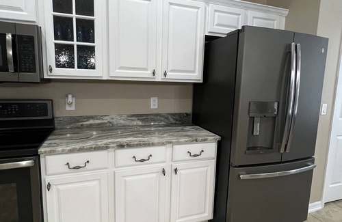 Eustis Haus | Prepared to be impressed! Welcome home! 7 bedroom 4 bathroom with HEATED pool!