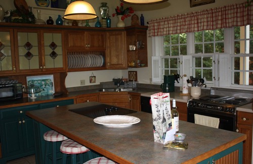 Cape May Point Haus | Pristine, Cozy, 4 bedroom Beach Cottage with a 40 foot screened in front porch!