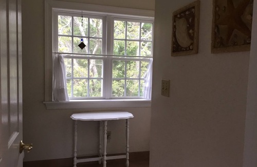 Cape May Point Haus | Pristine, Cozy, 4 bedroom Beach Cottage with a 40 foot screened in front porch!