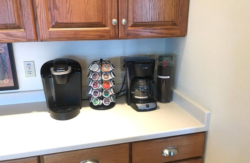 Ludington Haus | Private Hamlin Lake Water Front Cottage Perfect Family Retreat