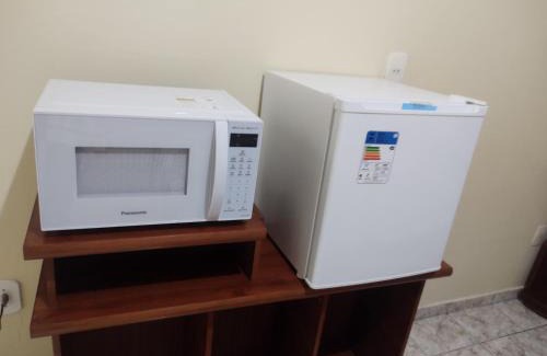 Holambra Haus | QUARTO CONFORTAVEL COM GARAGEM