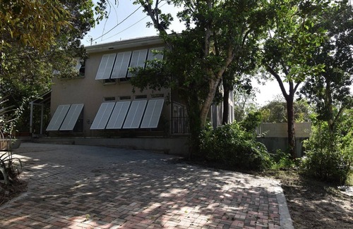 North Side Haus | Quiet, private nature retreat with pool and ocean views.