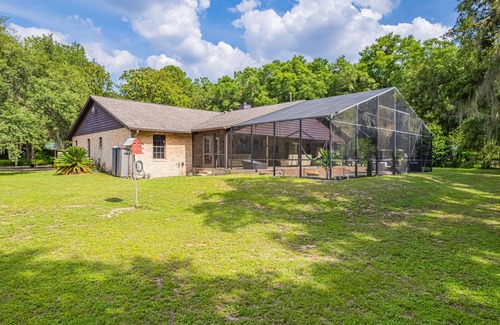 Clermont Haus | Ranch with pool/Lake fishing kayak Paddleboard Soccer Motocross 30 min to Disney