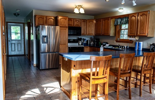 Oquossoc Haus | Rangeley Lake House in Oquossoc Cove, with hot tub