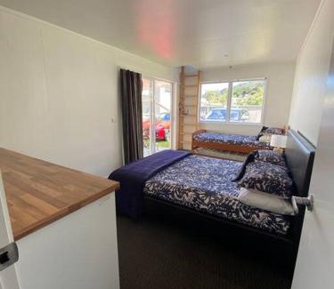 Rangiputa Haus | Rangi Beachfront -Luxury Beachfront Bach