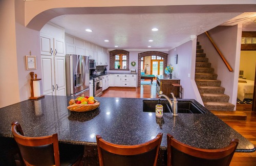 Glenwood Haus | Rare find! Spacious home near wedding venues & CB/OMA. Perfect for entertaining!