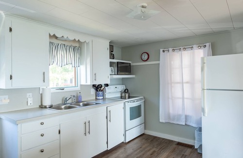 Mid-Coast and Islands Haus | Recently updated cottage featuring beautiful easterly views of Casco Bay