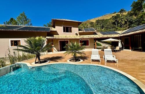 Olaria Haus | Refúgio em Lumiar: Piscina Aquecida, Área Gourmet e Rio Privado