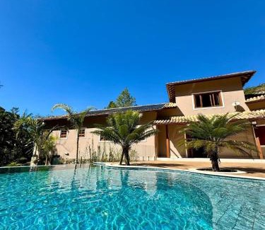 Olaria Haus | Refúgio em Lumiar: Piscina Aquecida, Área Gourmet e Rio Privado