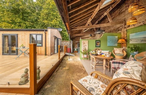 East Rudham Haus | Relax into this stunning, specially adapted lodge set within the old stables on the owner’s farm in