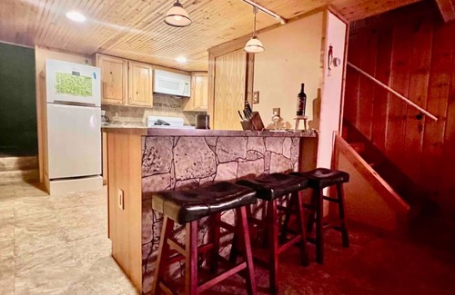 Manitou Beach Haus | Remodeled cozy retreat with a lake front view on Devils Lake. Pet Friendly!